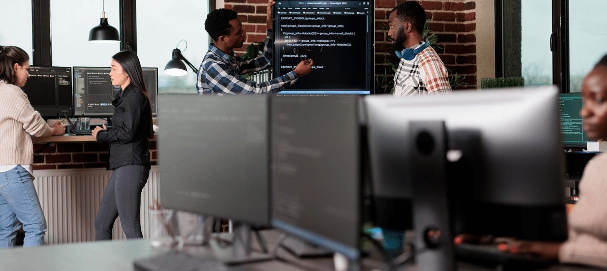people collaborating in a tech environment